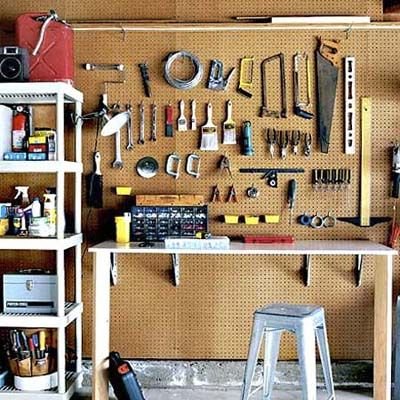 garage organization - pegboard wall - panels about $16 each at lowe's for 4x8 foot.